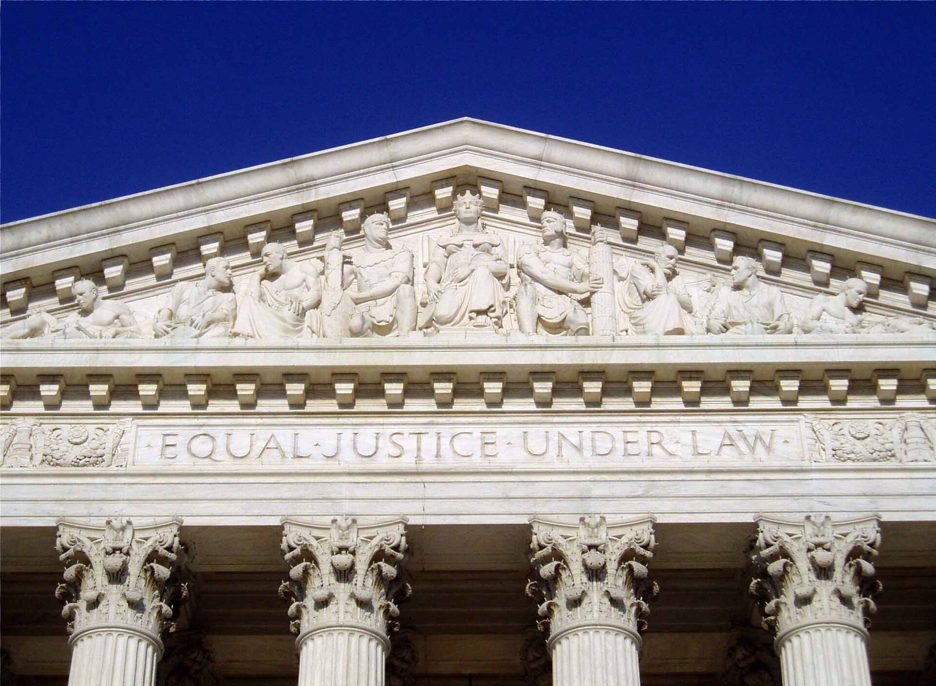 The inscription "Equal Justice Under Law" carved above the entrance of the Supreme Court Building.